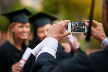 Image showing Hands, phone and graduation photograph with students on campus together for ceremony or celebration. Mobile, photographer and screen with graduate friends at university or college for achievement