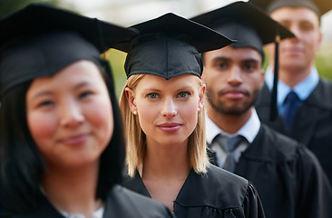 Image showing Portrait, graduation and woman student in row with friends for university or college ceremony outdoor. Face, education and scholarship with serious young person on campus for success or achievement