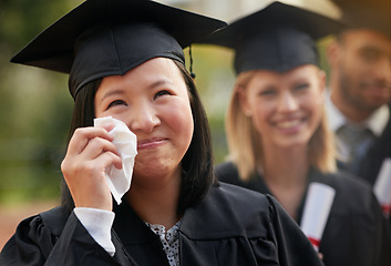 Image showing Students, graduation and woman with crying, achievement and happiness with success or ceremony. Tissue, tears or excited with people or friends with diploma or celebration with degree or university