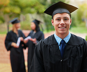 Image showing Portrait, graduation and smile with student man outdoor on campus for college or university ceremony. Face, education and scholarship with happy young graduate at ceremony for success or achievement