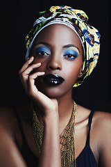 Image showing Black woman, wrap and portrait with fashion, makeup and beauty in studio. Cosmetics, trendy and art with African female person from Kenya with traditional head scarf accessory with dark background