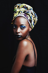 Image showing Black woman, beauty and portrait with fashion, hair scarf and makeup in studio. Cosmetics, trendy and afro style with African female person from Kenya with traditional head wrap with black background