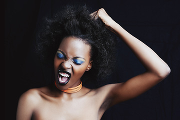 Image showing Beauty, hair and frustrated black woman on dark background for hairstyle, texture and natural afro. Haircare, salon crisis and angry African person with cosmetics, accessories and makeup in studio