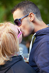 Image showing Kissing, fun and outdoor with couple, love and excitement with happiness and marriage with weekend break. People, culture and man with woman or romance with relationship and summer with vacation