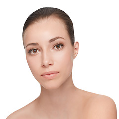 Image showing Portrait, beauty and skincare of woman, shine or glow isolated on a white studio background. Face, serious and young model in makeup cosmetics, dermatology and spa facial treatment for healthy skin