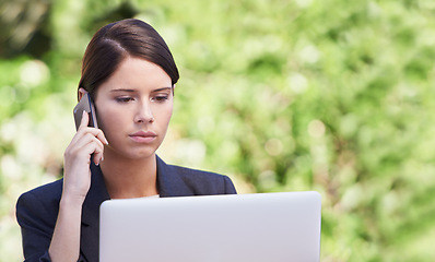 Image showing Business woman, serious and laptop with phone call outdoor, career and working with pc in nature. Employee, professional and worker for corporate company, technology and internet for remote office