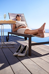 Image showing Relax, pool and woman in chair with champagne, brunch and business trip with hotel service. Travel, hospitality and businesswoman with drink, lunch and sunshine at luxury villa for summer holiday.
