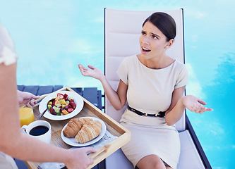 Image showing Woman, customer and angry with food service, upset and conversation with complain and nutrition. Client, swimming pool and lady frustrated with meal or hospitality industry with wrong order or review