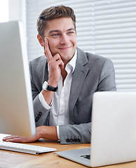 Image showing Employee, laptop and computer with office, workspace and technology for work. Businessman, corporate and desktop for accounting, business and research with productivity for planning or portfolio