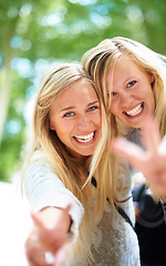 Image showing Peace, hands and women portrait in a park for fun, adventure or bonding outdoor together. V, sign or face of friends in a forest with freedom, travel and journey, excited and enjoying weekend reunion