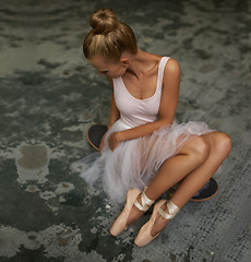 Image showing Skater, ballet and above of woman with skateboard for edgy fashion, trendy outfit and hipster style. Parking lot, funky aesthetic and ballerina on floor for dance hobby, sports and skating skill