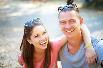 Image showing Love, portrait and happy couple hug in a park for travel, care and bonding together. Holiday, face and people embrace in a forest on day off, vacation or adventure on summer trip or date in nature