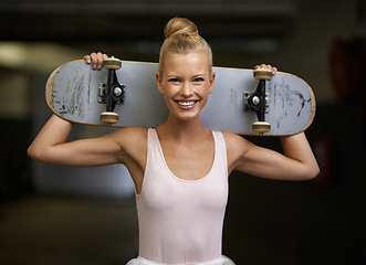 Image showing Happy, ballet and portrait of woman with skateboard for edgy fashion, trendy outfit and hipster style. Parking lot, artistic aesthetic and ballerina smile for dance hobby, sports and skating skill