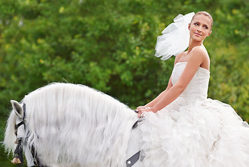 Image showing Bride, woman and riding with horse outdoor or happiness for celebration, marriage or confidence on mockup space. Wedding, person and stallion on lawn in field with smile, dress and animal at ceremony