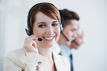 Image showing Woman, callcenter and phone call, communication and contact us with headset and mic, coworking and smile. Telecom, customer service or telemarketing, agent with CRM for tech support or help desk