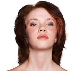 Image showing Closeup, woman and face with makeup in studio, white background and lipgloss in soft eyeshadow, mascara and confidence. Portrait, skin and routine with redhead in cosmetics for beauty and wellness