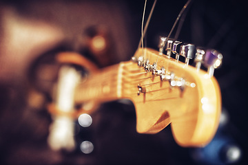 Image showing Closeup, guitar and music in studio for band, rehearsal and session to perform on stage, song and entertainment. Artist, recording and album for live at concert, loud with audio for audience.