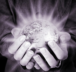 Image showing Globe in a girl's hands