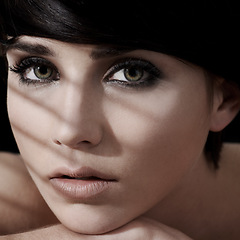 Image showing Makeup, portrait and closeup of woman with beauty, wellness and glowing skin treatment closeup. Face, headshot or calm female model relax with eye cosmetics, eyeshadow or neutral, glamour or lipstick
