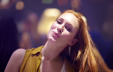 Image showing Woman, happy and portrait at party or concert, smiling and entertainment at special event on weekend. Female person, bokeh and dancing at club on vacation or holiday, celebrating and music festival