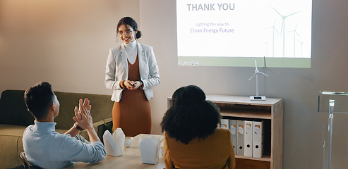 Image showing Applause, woman and presentation with workshop, eco friendly and research with corporate training, conference and review. Person, presenter and group with sustainability, feedback and energy seminar