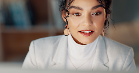 Image showing Happy woman at desk with computer, thinking or typing email, report or article at digital agency. Internet, research and businesswoman at tech startup with online review, networking project and smile