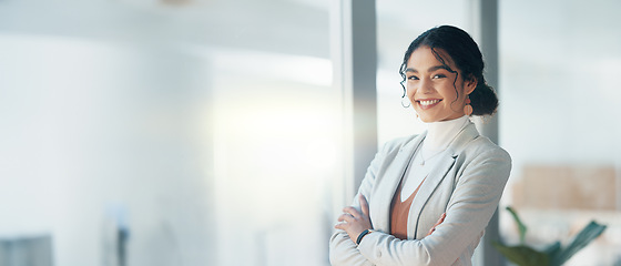 Image showing Happy, face and woman with arms crossed in office with business pride and corporate work. Smile, company and portrait of a female employee with confidence and professional empowerment at an agency
