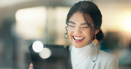 Image showing Business woman, tablet and laugh in night, office and reading an email notification, meme or story on web. Entrepreneur, digital touchscreen and happy with funny video, chat or post on social media