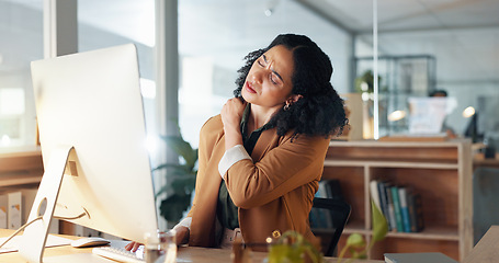 Image showing Woman, neck and hand is sore, office and ache or cramp, laptop and business or pain. Businesswoman, injury and entrepreneur of startup, massage and arthritis or frustrated, fatigue and workplace