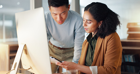 Image showing Business people, documents and coaching in schedule planning, project or strategy together at office. Man giving paperwork to woman for review, plan or tasks on computer in team research at workplace