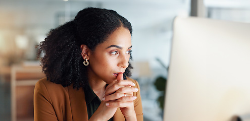 Image showing Woman at computer in office, thinking and reading email, feedback review or web article at digital agency. Internet, research and girl at tech startup networking, business schedule or admin project.