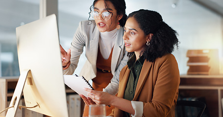 Image showing Communication, coaching and women in business with documents for training and project management on laptop. Instruction, mentor or leader talking to colleague with paperwork for report in office