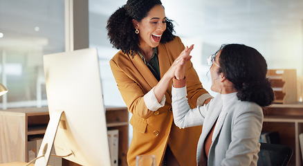 Image showing Women, business and high five for teamwork success, support and collaboration with computer in office. Celebration, colleagues and happiness together with pride or congratulations for work feedback