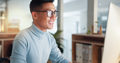 Image showing Asian man at computer, glasses and ideas, thinking and reading email, web review or article at digital agency. Research, reflection and businessman at tech startup networking on business website.