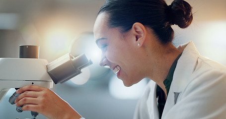 Image showing Science, research and happy woman with microscope, technology or biotech data in laboratory. Medical innovation, scientist or lab technician in study in healthcare, medicine or pharmaceutical future