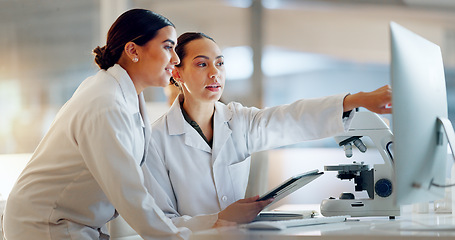 Image showing Scientist, women and teamwork on tablet and computer for laboratory advice, medical research and night planning. Students, science people or mentor on digital technology of test results or comparison