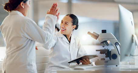 Image showing Teamwork, scientist or doctors high five for success, medicine breakthrough or partnership in lab. Science, collaboration or happy women celebrate medical support, goal target or DNA news with smile