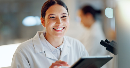 Image showing Scientist, woman and tablet, microscope or laboratory research for DNA analysis and happy with medical study. Student or science expert in biotechnology with digital software and lens check for data