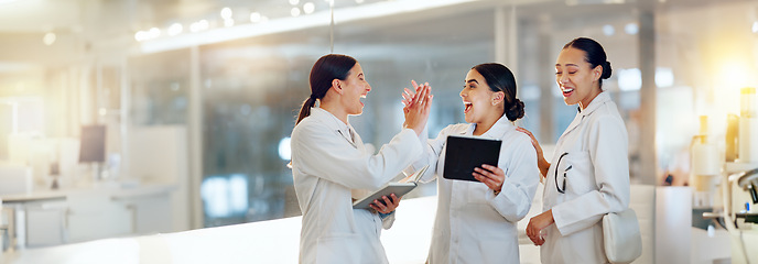 Image showing Scientist, high five and research success on tablet for teamwork, medical goals and achievement in laboratory. Science students or women group with wow, solution and check data on digital technology