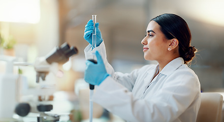 Image showing Science, laboratory and woman with pipette, test tube and biotech solution in research. Medical innovation, scientist or lab technician in study for healthcare, medicine and vaccine results feedback.