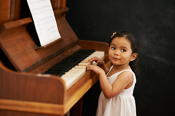 Image showing Piano, girl and baby in home for learning, practice and classical education with musical notes. Training, melody and kid with talent, creative or hobby with instrument, child development or skill