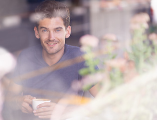 Image showing Man, portrait and drinking tea in coffee shop, window and hot beverage for inspiration in cafe. Happy male person, smile and relaxing in restaurant with espresso, smiling and comfortable on weekend