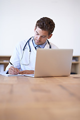 Image showing Doctor, laptop and notebook for writing at desk for medical research, schedule or patient report in office. Man, technology and pen on paper for results, planning or health insurance in hospital