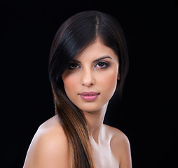 Image showing Beauty, hair care and portrait of woman with makeup in studio for health, wellness and salon treatment. Confident, cosmetic and female person with facial and hairstyle routine by black background.