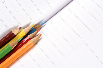 Image showing Color pencil and agenda