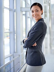 Image showing Portrait of businesswoman, arms crossed or finance career in office for professional job or corporate company. Face, proud employee or work as financial consultant or happy female worker in workplace