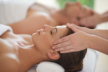 Image showing Massage, head and couple in spa to relax with luxury treatment for wellness on holiday or vacation. Beauty, care and calm people together in hotel, salon or resort for healthy facial or skincare