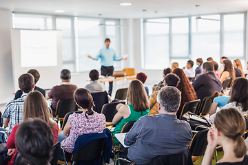 Image showing Speaker giving presentation on business conference.