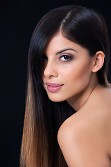 Image showing Hair care, health and portrait of woman in studio with salon, beauty or conditioner treatment. Wellness, confident and female person with long, shiny and cosmetic hairstyle by dark black background.