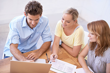 Image showing Colleagues, laptop and teamwork for brainstorming and research at modern office in Australia. Employees, people or workers with smiles, table and paperwork for business planning or project management